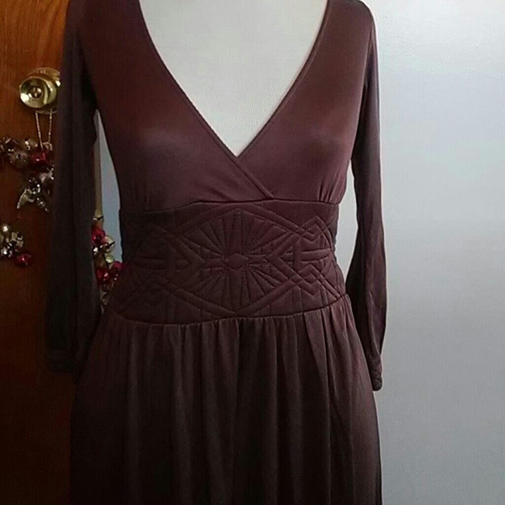 Nice fitted at the top dress. Flare at the bottom.